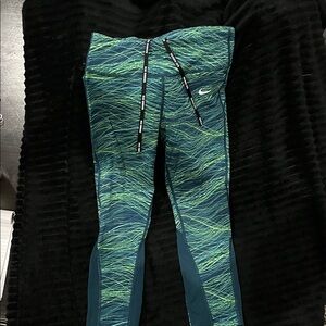 Nike women’s Teal and Lime Patterned Leggings